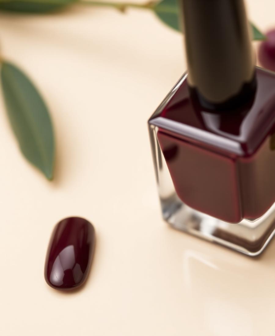 Deep burgundy nail polish